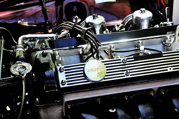 Ales, France - April 11, 2015: Detail of an engine Jaguar XJ photographed vintage car rally Town Hall Square in the town of Ales, in the Gard department 