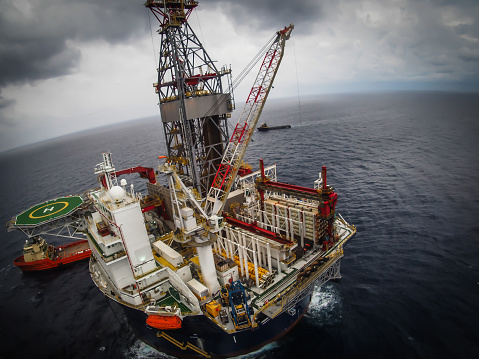 Offshore oil drilling rig or platform, aerial view, petroleum industry in gulf of mexico