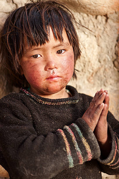 istock Tibetan child saying Namaste! 472998858