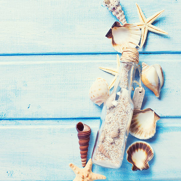 istock Marine items on blue painted wooden background. 473000286