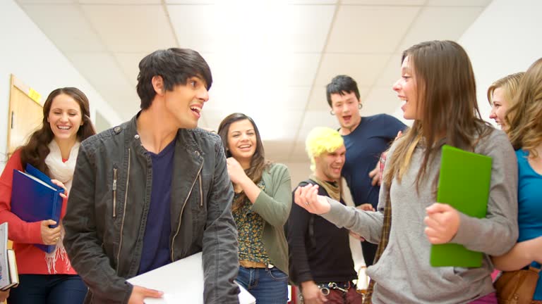 Students walk through hallway