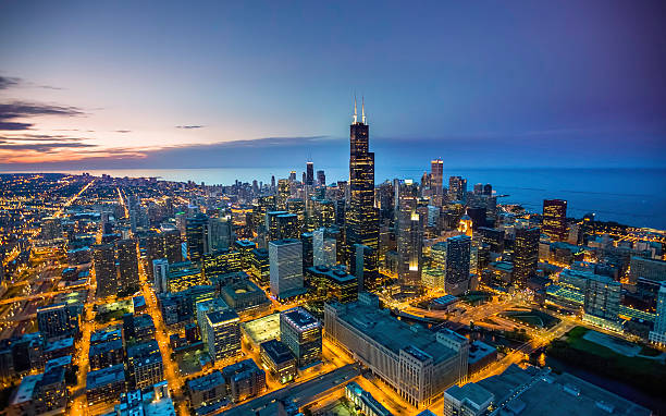 Chicago skyline aerial view at dusk Chicago skyline aerial view at dusk chicago stock pictures, royalty-free photos & images