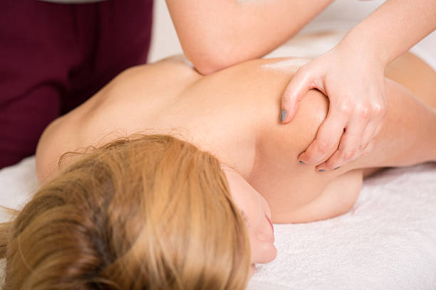 istock Chiropractor treating woman 473002934