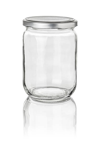 istock Clear transparent see through glass jar on white background 473007284