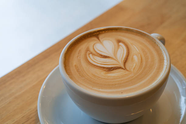 istock Latte Coffee art on the wooden desk 473016908