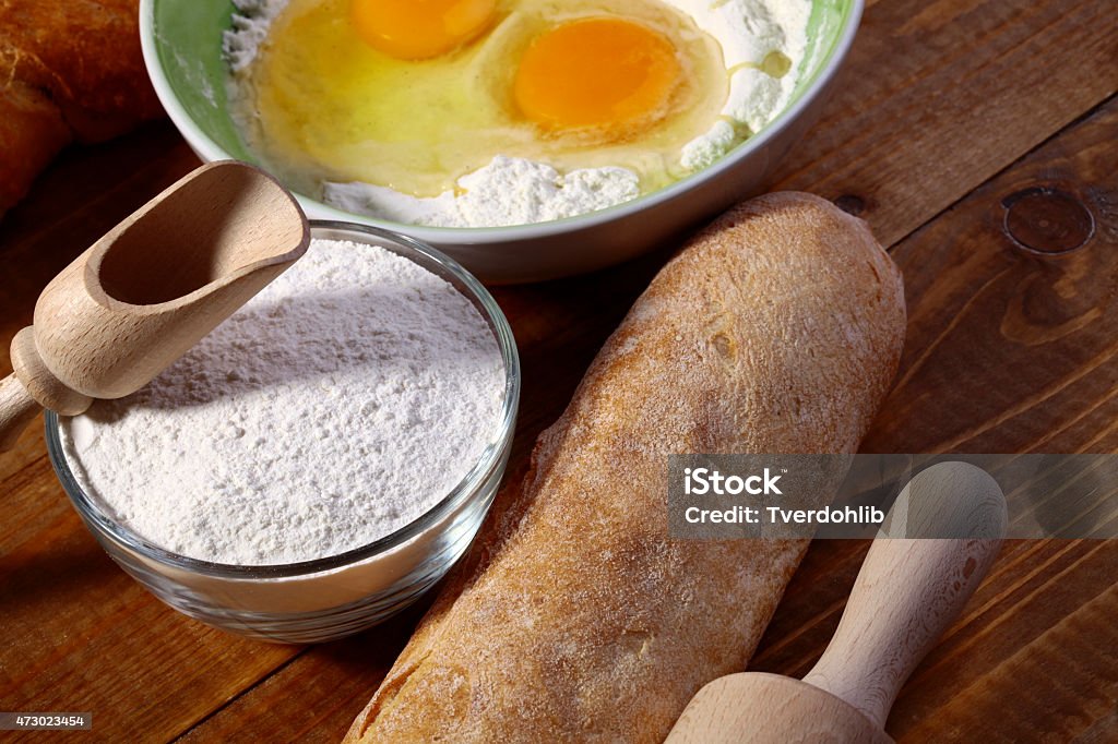 Set of ingredients Set of ingredients and appliances for baking with yolk in flour closeup, horizontal picture 2015 Stock Photo