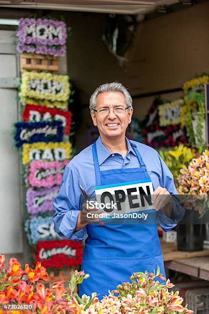 Open For Business Hispanic Small Business Flower Shop Owner Stock Photo - Download Image Now