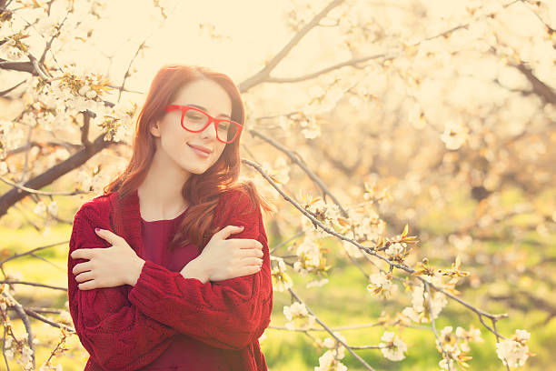 istock women in blossom apple tree garden 473034438
