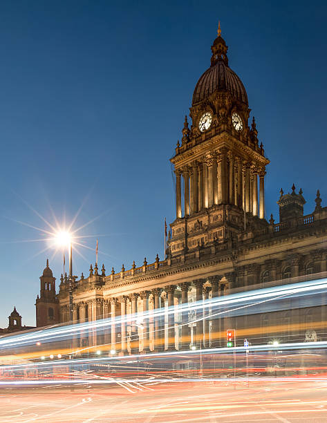 Town Hall in Leeds, West Yorkshire, UK (Twilight Shot) Beautiful Twilight Shot of Town Hall in Leeds, West Yorkshire, UK with Light Trail. Also a local landmark of Leeds and a public building. leeds photos stock pictures, royalty-free photos & images
