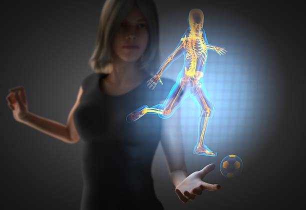 istock woman and hologram with soccer 473040112