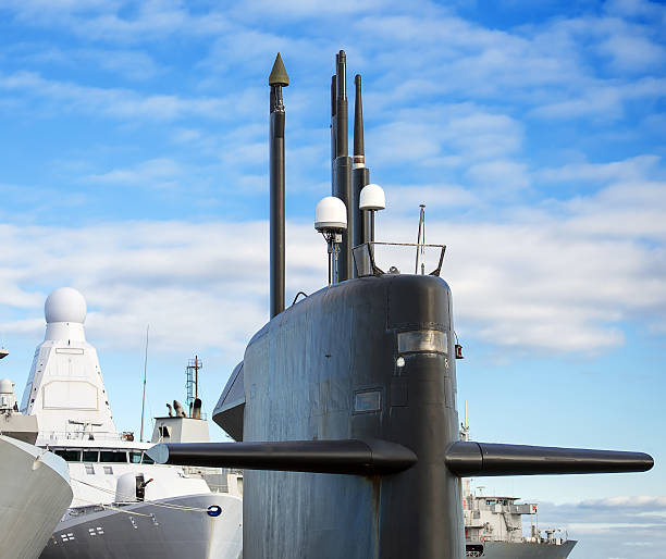 istock Naval fleet. Submarine and warships with guns. 473040500