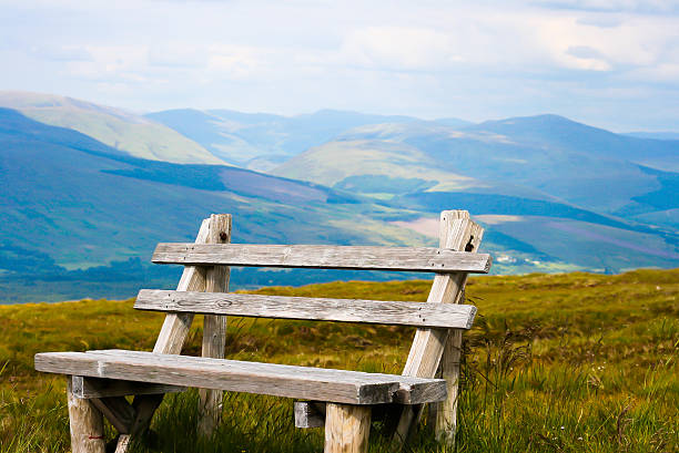Wooden Bench on a mountain range, Scotland