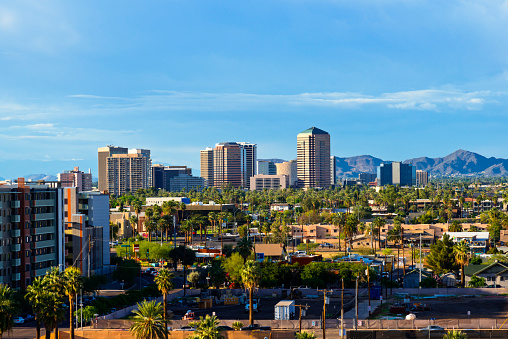 Downtown Scottsdale and suburbs of Phoenix, Arizona, with the White Tank Mountain Range in the background 