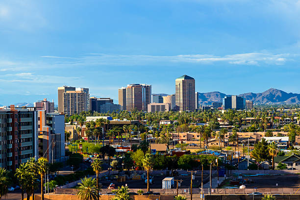 Scottsdale Arizona Downtown Scottsdale and suburbs of Phoenix, Arizona, with the White Tank Mountain Range in the background  scottsdale arizona stock pictures, royalty-free photos & images