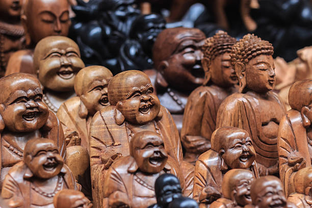 istock wood statues of buddha 473048896