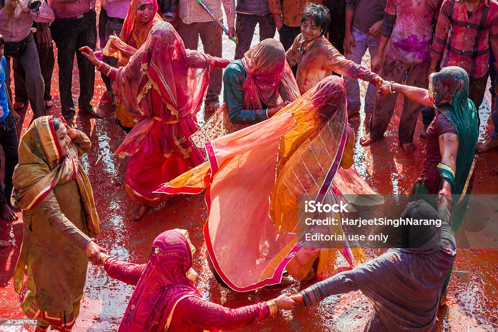 Holi dance celebration in Nandgaon, India Nandgaon, India - March 10, 2014 : Senior Indian women celebrate Holi dancing at Krishna temple in Nandgaon. Holi Stock Photo Holi dance celebration in Nandgaon, India Nandgaon, India - March 10, 2014 : Senior Indian women celebrate Holi dancing at Krishna temple in Nandgaon. Holi Stock Photo