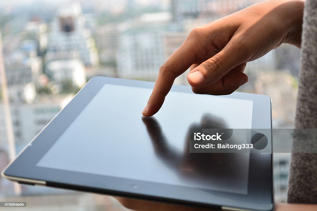 Touching Screen Of A Tablet Computer Stock Photo - Download Image Now ...