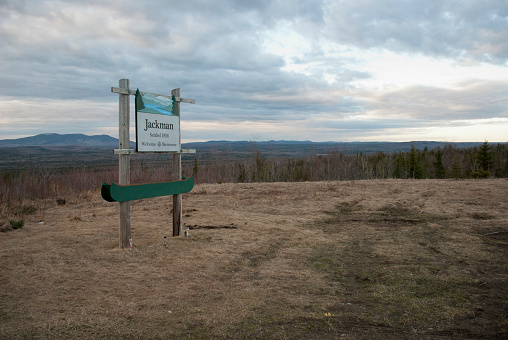 Jackman, ME, U.S. - May 2, 2015: A sign welcoming guests into the Town of Jackman, Maine; only sixteen miles from the Canadian border. 