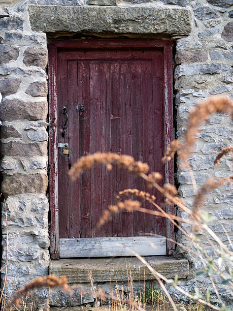 istock derelict old building door,Derbyshire,britain 473054826