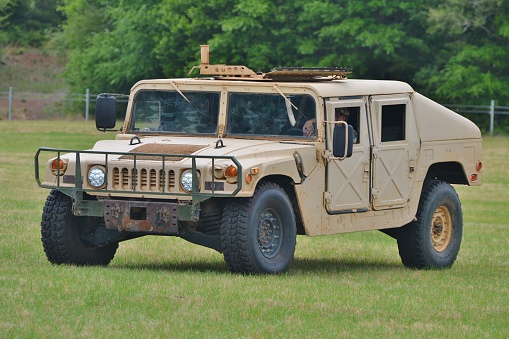 Crestview, USA - May 10, 2014: A beige Humvee/Hummer/HMMWV truck used by the U.S. Army for troop transport. 