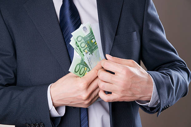 istock Businessman with money in studio 473055146