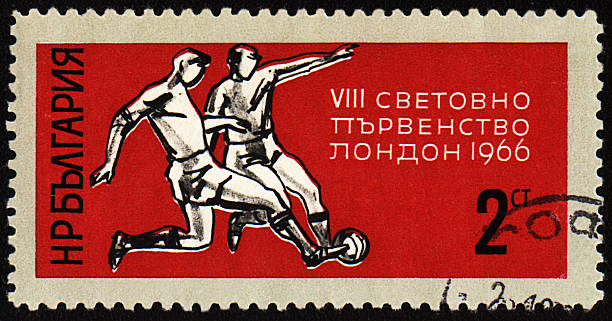 Football players on post stamp stock photo