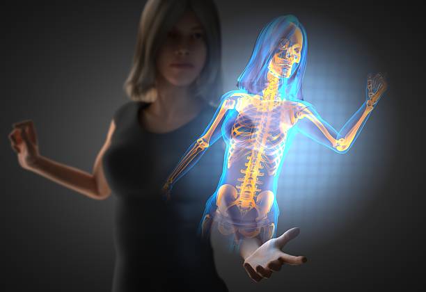 istock woman and hologram with bones radiography 473057918