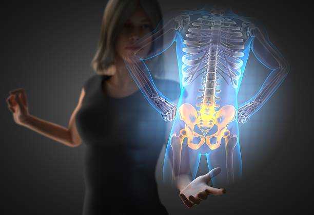 istock woman and hologram with bones radiography 473057946
