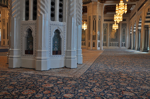 The Sultan Qaboos Grand Mosque in Muscat, Oman. Part of the main prayer area.