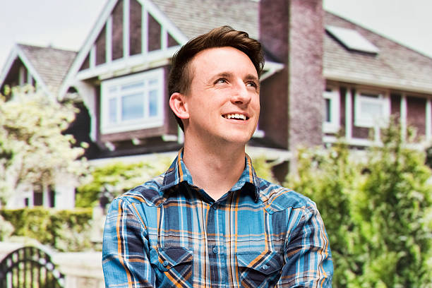 istock Smiling casual man outdoors 473058256