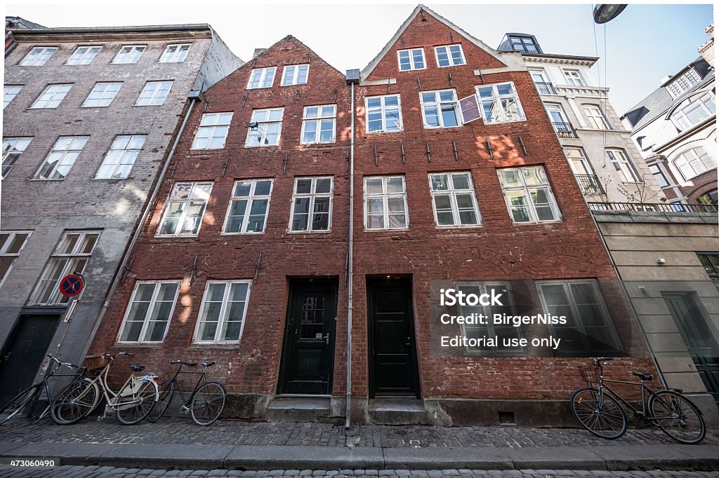 Old building in central Copenhagen, Denmark Сopenhagen, Denmark - May 3, 2015: Old listed building from 1650 in Magstræde, Copenhagen, Denmark, The street Magstræde avoided partly the two devastating Copenhagen fires in 1728 and in 1795 and therefore contains some of the oldest civil houses. 17th Century Stock Photo