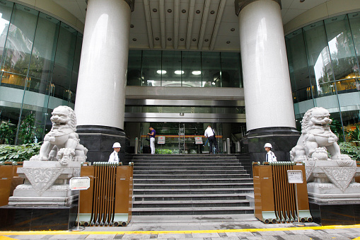 Guangzhou, Сhina - May 7, 2015: Police guard court entrance in Guangzhou, Guangdong province, China, May 7, 2015. An Australian man Peter Gardner on Thursday faced a possible death sentence on charges of attempting to smuggle millions of dollars worth of drugs out of China. Chinese authorities arrested New Zealand-born Peter Gardner, 26, at the international airport in the southern city of Guangzhou last November, carrying bags of nearly 30 kg (66 lb) of methamphetamine, known as \