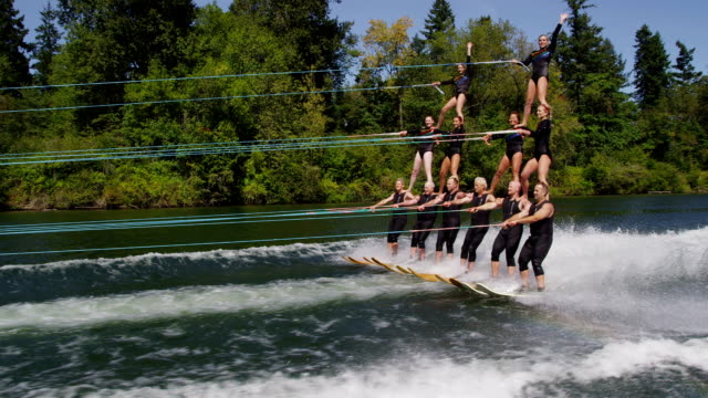 Water ski team in double pyramid formation