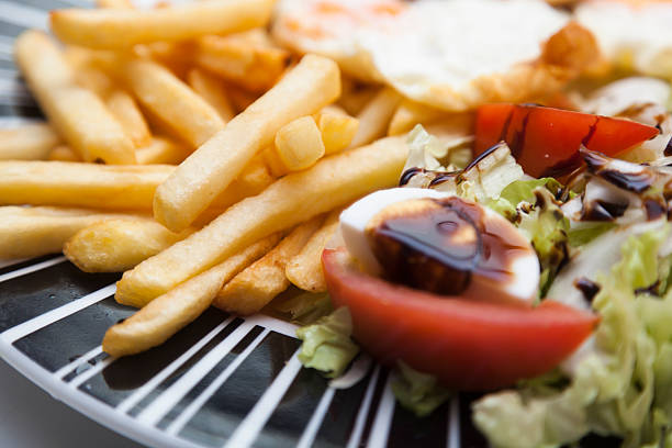 istock French fries witth rice,eggs and Lettuce 473063510
