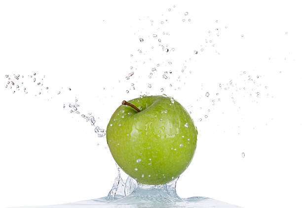 istock Fresh apple in water splash on white backround 473066614