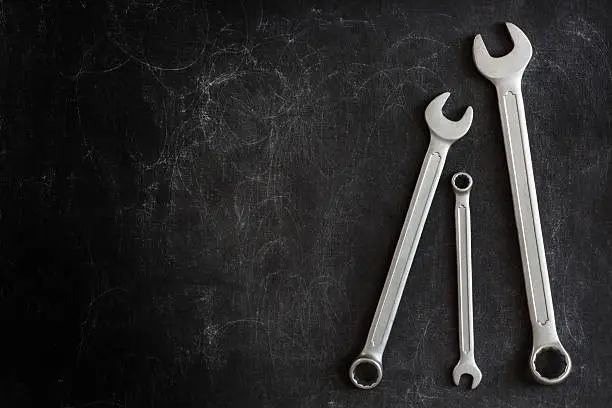 Photo of Wrenches on a dark background