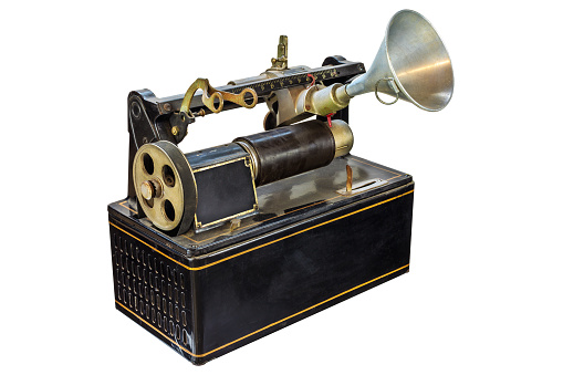 Ancient rusty dictaphone isolated on a white background