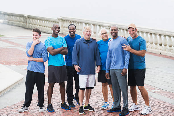 istock Multiracial group of men wearing blue shirts 473071400