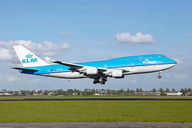 Amsterdam Airport Schiphol - Boeing 747 of KLM lands Amsterdam, The Netherlands - May 7, 2015: A Boeing 747-406 (M) of KLM lands at Amsterdam Airport Schiphol (The Netherlands, AMS) on May 7, 2015. The name of the runway is Polderbaan. klm stock pictures, royalty-free photos & images