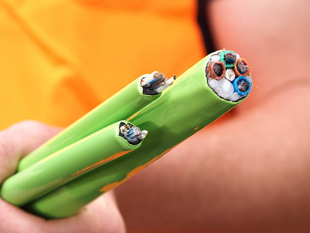 Green fibre optic cables from 72 to 576 fibers Green Nylon jacketed 576, 144 and 72 fiber optic ribbon cable end used for the National Broadband Network in Australia, a fast internet rollout covering 90% of Australia, held as a bundle typical for a cable duct in Melbourne, Australia broadband isp stock pictures, royalty-free photos & images