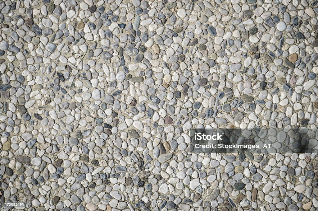 Little stones on pedestrian way Small stones on pedestrian way. 2015 Stock Photo