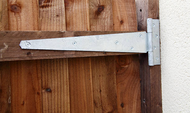 galvanised gate hinge close up of a single galvernised gate hinge hinge stock pictures, royalty-free photos & images