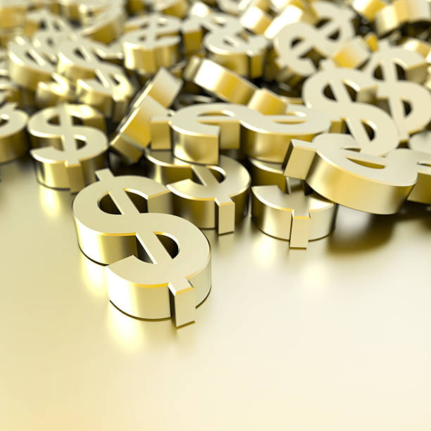 istock Image of a pile of solid gold dollar symbols 473083154