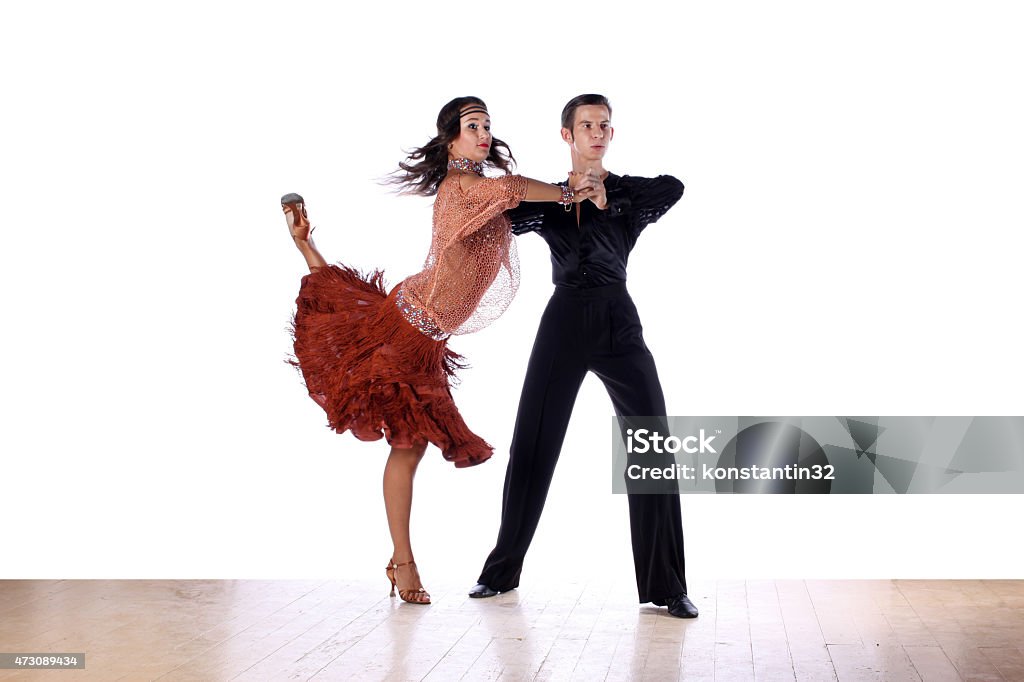 Latino dancers in ballroom Latino dancers in ballroom against white background 2015 Stock Photo