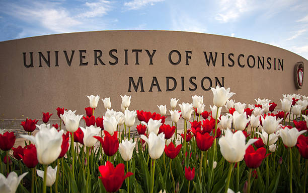 University of Wisconsin Madison Sign Madison, Wisconsin, USA - May 8, 2015: The University of Wisconsin crest and welcome sign is seen near the entrance to the UW Madison campus in Madison on May 8, 2015. dane county photos stock pictures, royalty-free photos & images