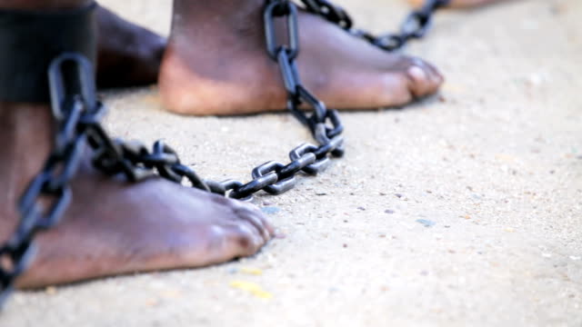 Slaves feet shackled together