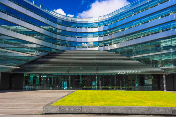 Green square with benches in front of office buildings compex in Gdynia, Poland