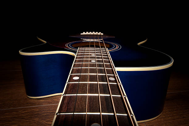 istock Angle of the arm of a blue guitar 473096230