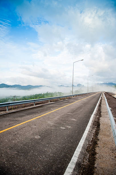 istock empty street in the fog 473096946