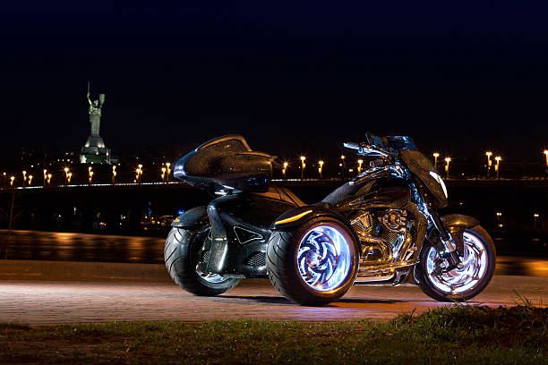 istock Black trike standing on the night street 473100282